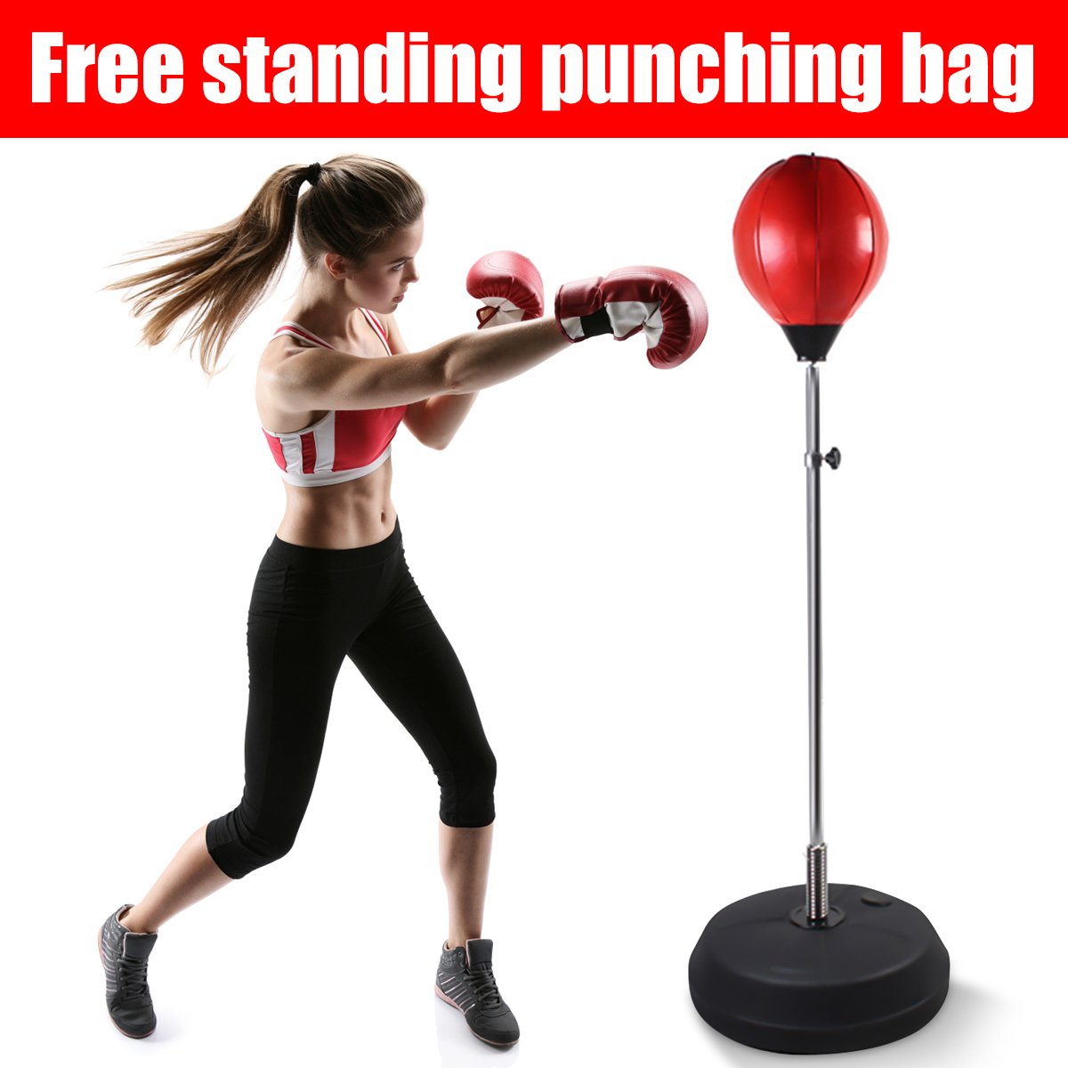 female striking freestanding red punching bag with black base wearing boxing gloves 