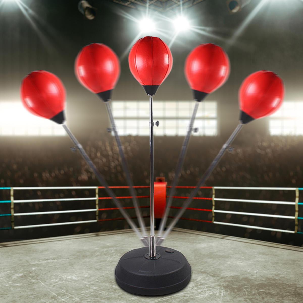 freestanding heavy duty red boxing target with black base inside boxing ring 